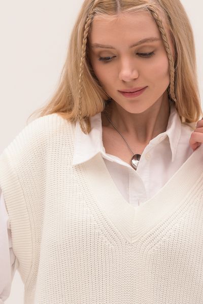 Long women's eco-vest. Color: Milk