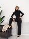 Warm and soft women's turtleneck with elastane. Color: Black
